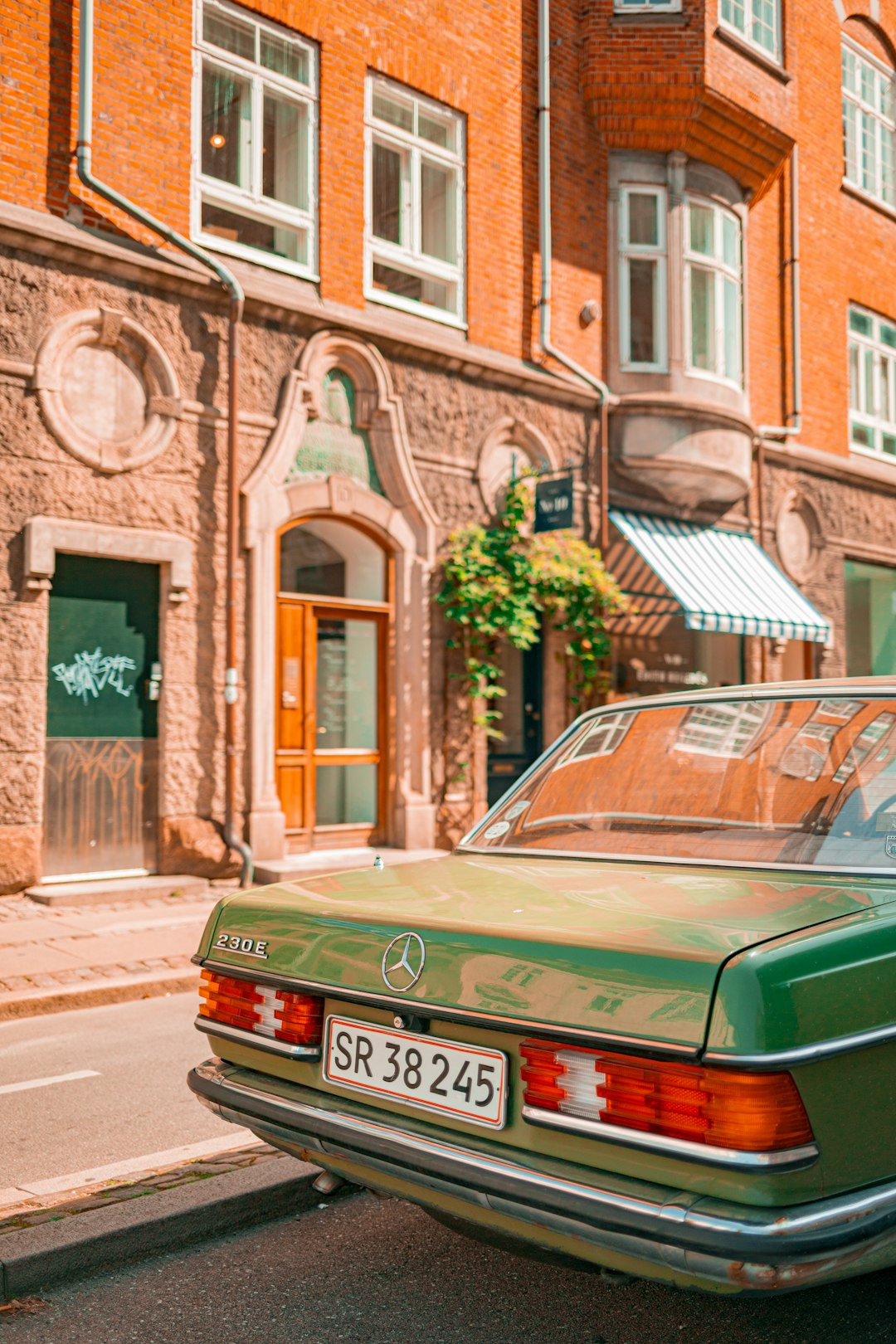 Classic Volvo P1800 vintage car in Swedish countryside